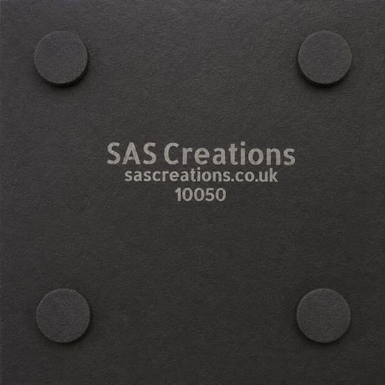 Underside of whiskey barrel slate coaster with four protective feet