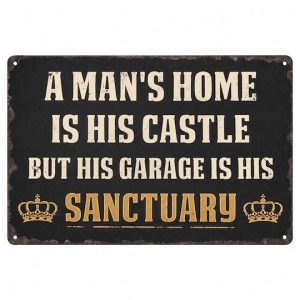 Garage sanctuary sign with cream lettering, gold crowns and the quote A man’s home is his castle.