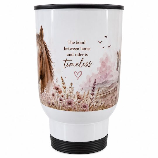 Horse-themed travel mug with floral artwork and “The bond between horse and rider is timeless” quote.
